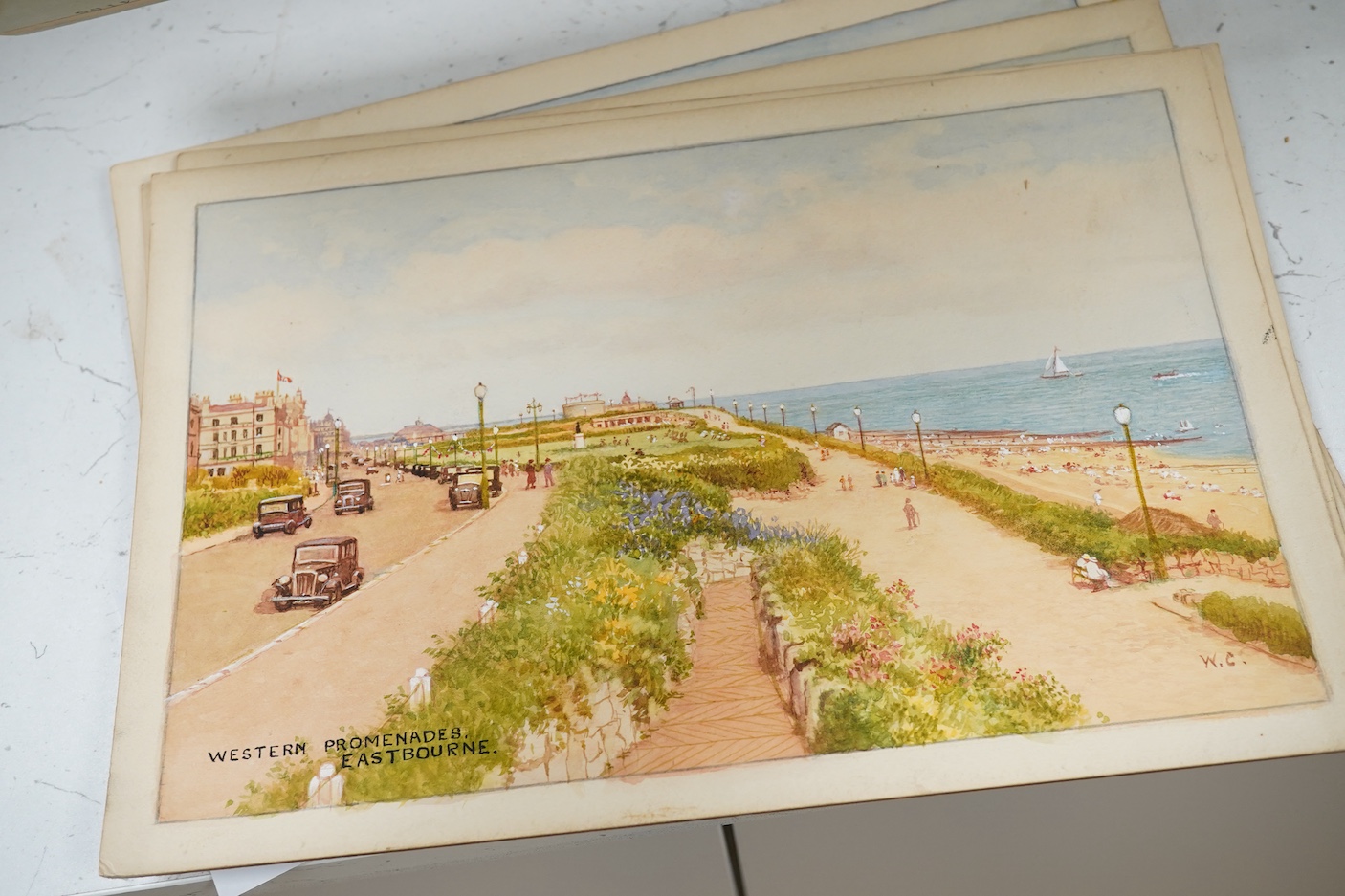 William Affleck, (Aka Carruthers, 1868-1943), a set of seven original watercolours for postcard designs, Eastbourne scenes to include, ‘The Band Enclosure’, ‘The Wish Tower’, ‘Beachy Head’ and ‘The Beach’, each initialle